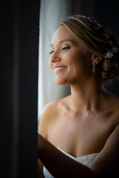 wedding photography space coast bride prep window light beauty portrait