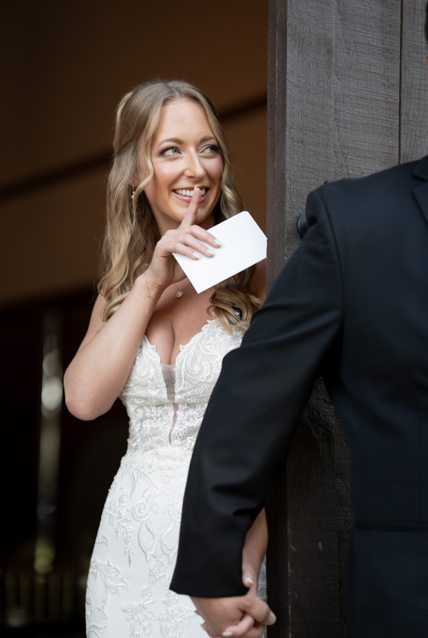 wedding photography space coast first look secret bride and groom outside barn