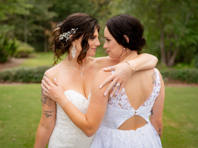 wedding photography space coast portrait session brides lesbian hug lgbtq