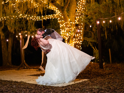 wedding photography space coast portrait session night bride and groom dip kiss