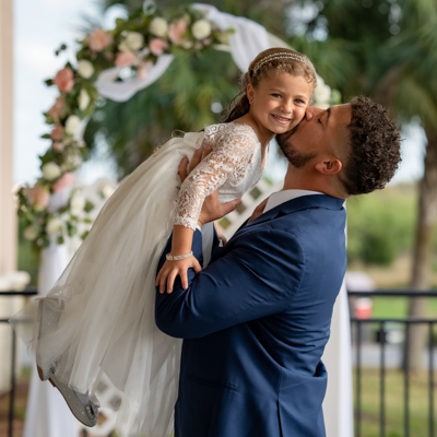 wedding photography space coast reception entrance groom kiss daughter