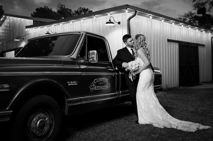 wedding photography space coast truck bride and groom outside black and white